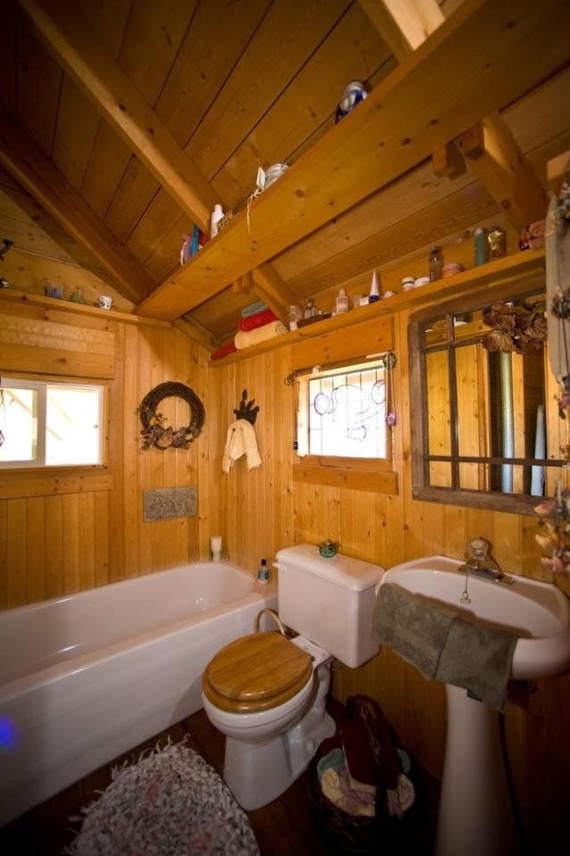Quietude, a 300 sq ft tiny house with sleeping loft | www.facebook.com/SmallHouseBliss