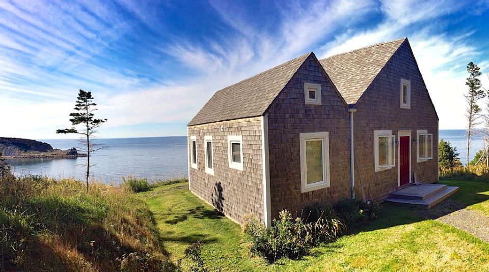 An owner-built cottage on Cape Breton Island with traditional and contemporary details. It has two bedrooms in 768 sq ft. | www.facebook.com/SmallHouseBliss