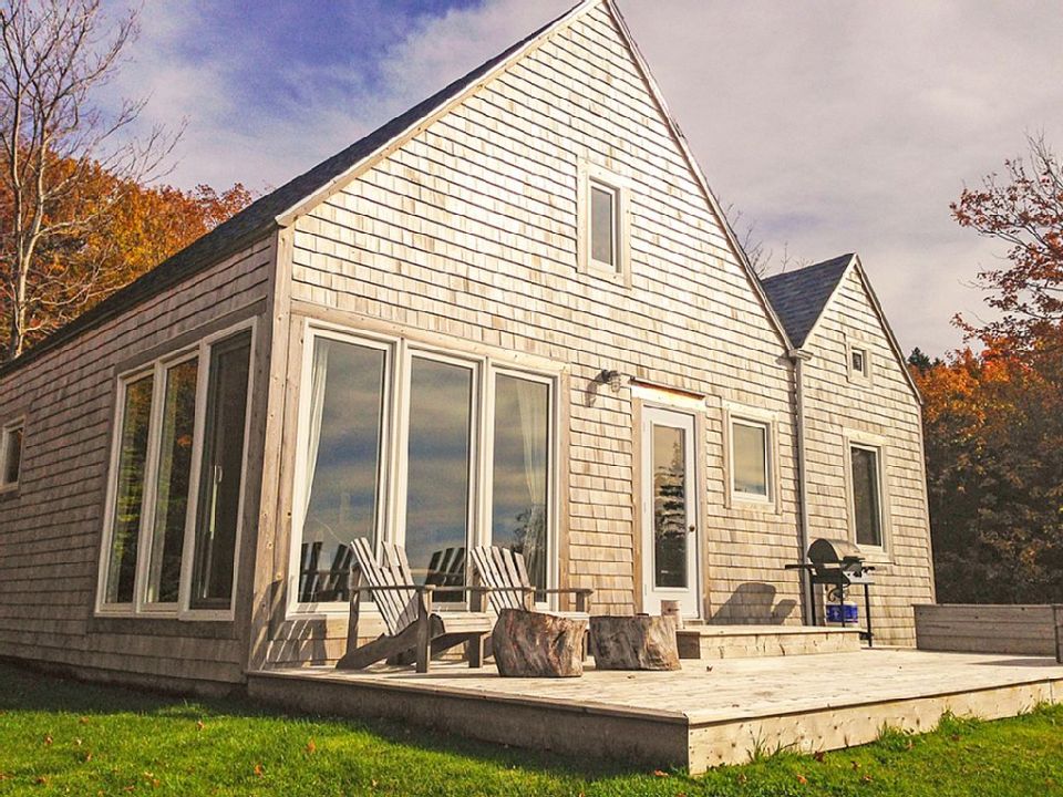 An owner-built cottage on Cape Breton Island with traditional and contemporary details. It has two bedrooms in 768 sq ft. | www.facebook.com/SmallHouseBliss