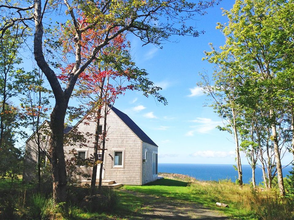 An owner-built cottage on Cape Breton Island with traditional and contemporary details. It has two bedrooms in 768 sq ft. | www.facebook.com/SmallHouseBliss