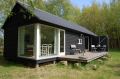 The Længehuset, a modular vacation house from Denmark with 2 bedrooms in 592 sq ft. | www.facebook.com/SmallHouseBliss