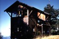Reminiscent of forest fire lookout towers, this 672 sq ft cabin has two separate sleeping lofts. | www.facebook.com/SmallHouseBliss
