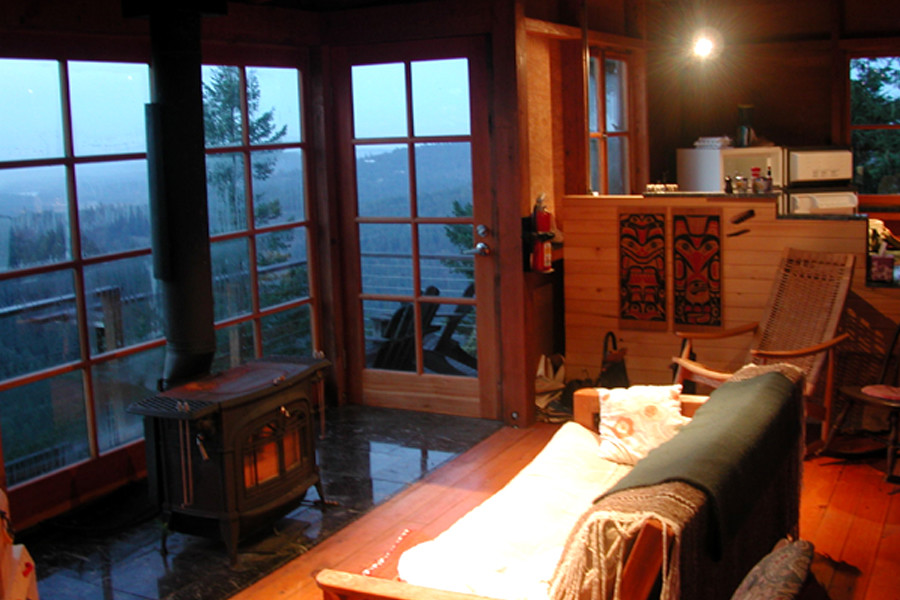 Reminiscent of forest fire lookout towers, this 672 sq ft cabin has two separate sleeping lofts. | www.facebook.com/SmallHouseBliss