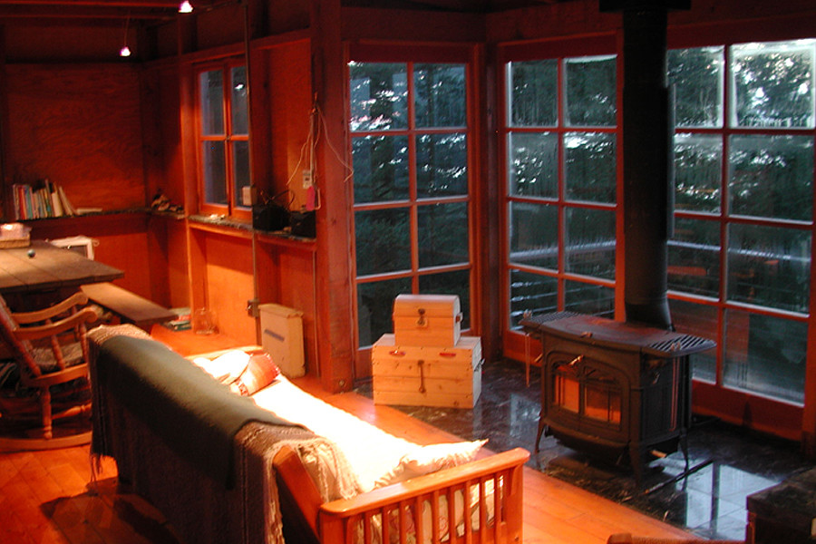 Reminiscent of forest fire lookout towers, this 672 sq ft cabin has two separate sleeping lofts. | www.facebook.com/SmallHouseBliss