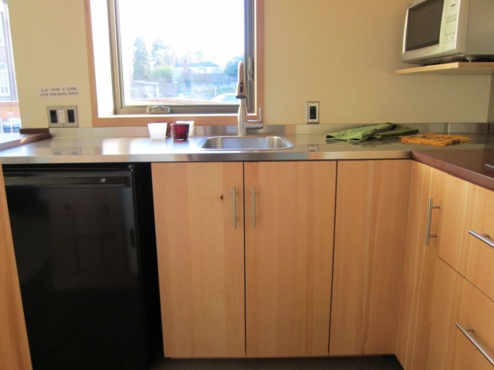 The Mini-B, a tiny house built to the Passive House standard for ultra-high energy-efficiency. It is a 300 sq ft studio with a sleeping loft. | www.facebook.com/SmallHouseBliss