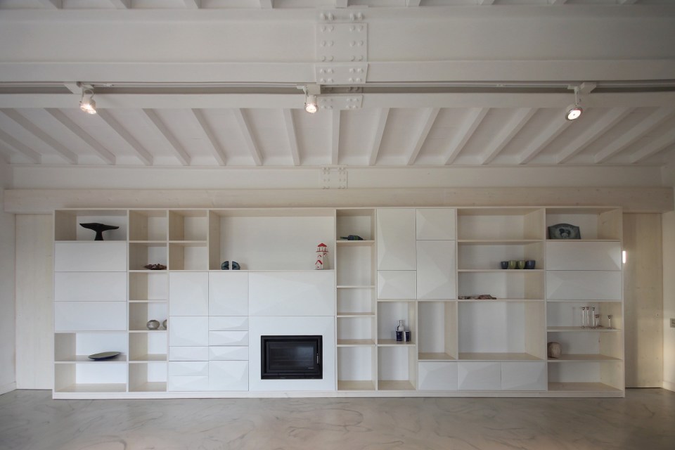 A crumbling stone barn in Tuscany was turned in a contemporary home with 2 bedrooms in 969 sq ft. | www.facebook.com/SmallHouseBliss