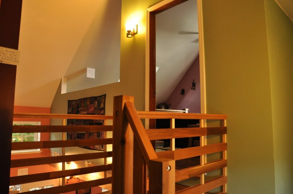 This shingled backyard cottage has 1 bedroom and a small office in 799 sq ft. | www.facebook.com/SmallHouseBliss