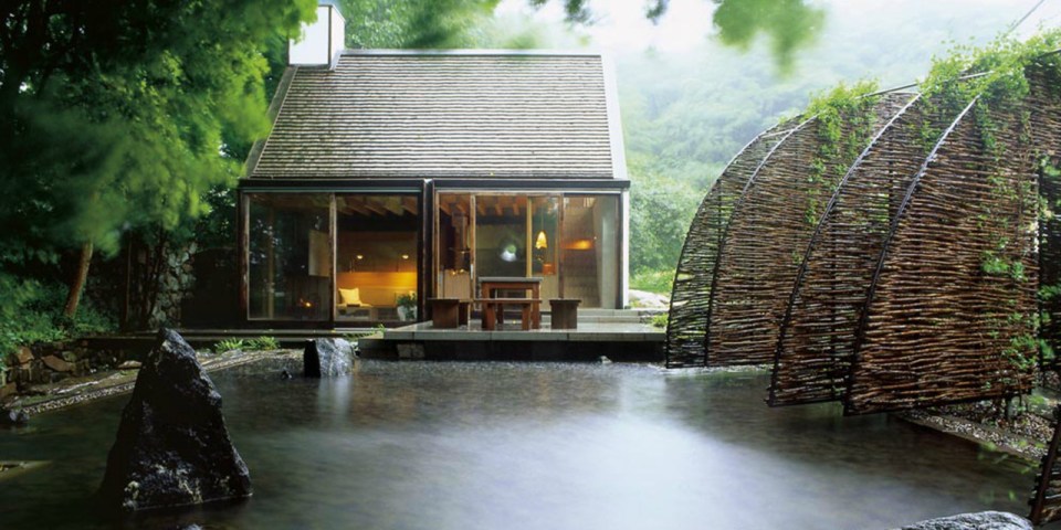 The Mill House, a finely-crafted guest house set among beautiful water features and lush landscaping. It has one bedroom and a sauna in 538 sq ft. | www.facebook.com/SmallHouseBliss