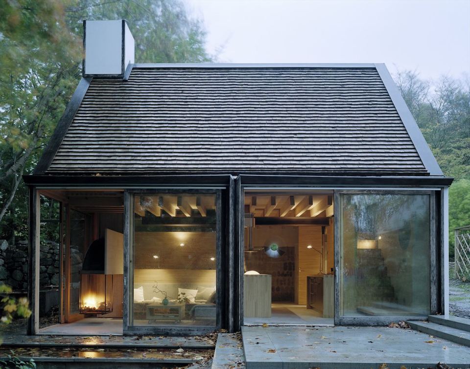 The Mill House, a finely-crafted guest house set among beautiful water features and lush landscaping. It has one bedroom and a sauna in 538 sq ft. | www.facebook.com/SmallHouseBliss