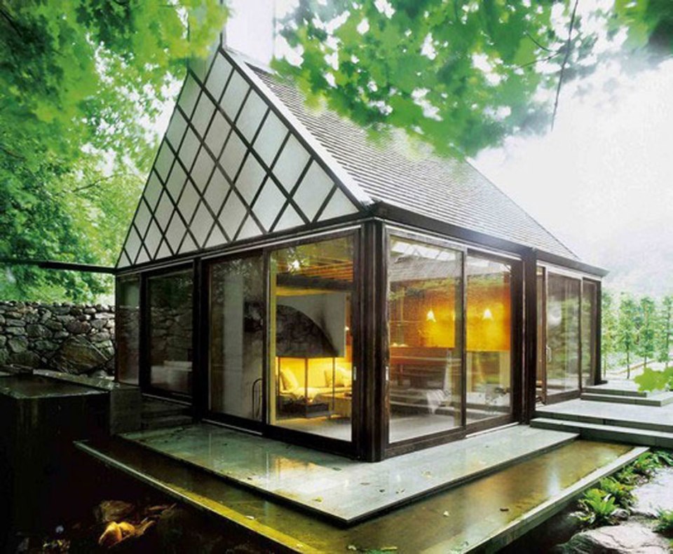 The Mill House, a finely-crafted guest house set among beautiful water features and lush landscaping. It has one bedroom and a sauna in 538 sq ft. | www.facebook.com/SmallHouseBliss