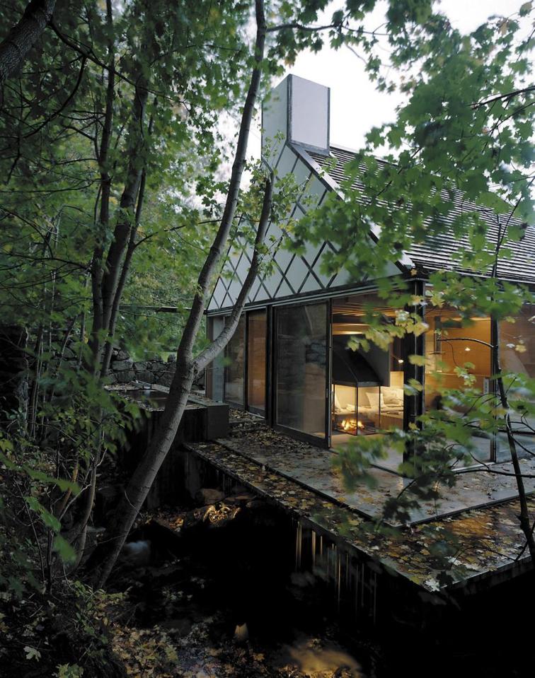 The Mill House, a finely-crafted guest house set among beautiful water features and lush landscaping. It has one bedroom and a sauna in 538 sq ft. | www.facebook.com/SmallHouseBliss