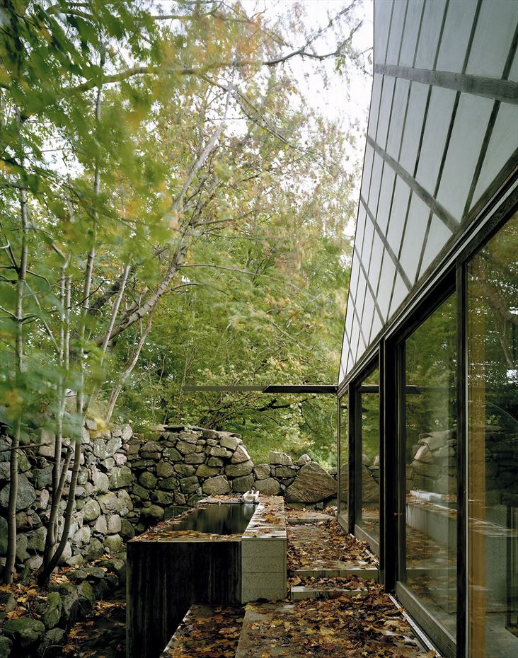 The Mill House, a finely-crafted guest house set among beautiful water features and lush landscaping. It has one bedroom and a sauna in 538 sq ft. | www.facebook.com/SmallHouseBliss