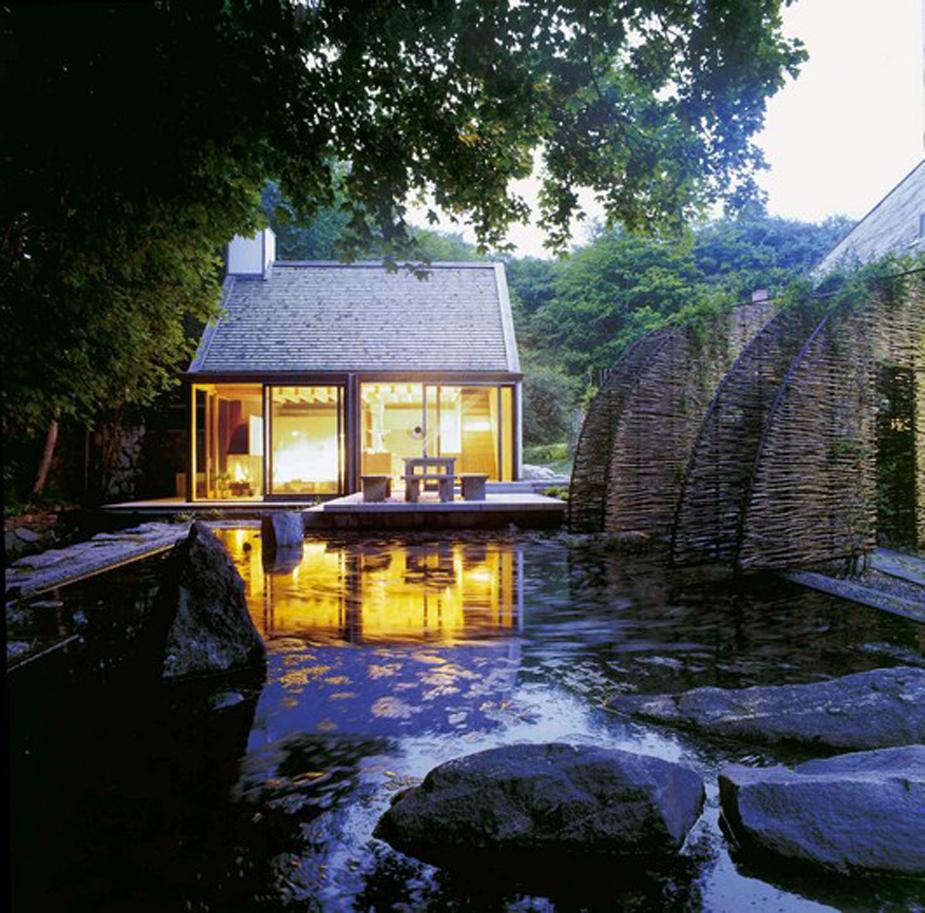 The Mill House, a finely-crafted guest house set among beautiful water features and lush landscaping. It has one bedroom and a sauna in 538 sq ft. | www.facebook.com/SmallHouseBliss