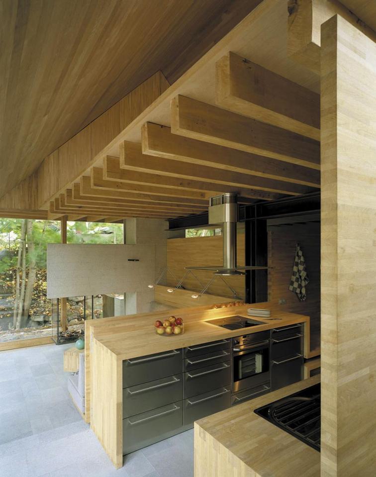 The Mill House, a finely-crafted guest house set among beautiful water features and lush landscaping. It has one bedroom and a sauna in 538 sq ft. | www.facebook.com/SmallHouseBliss