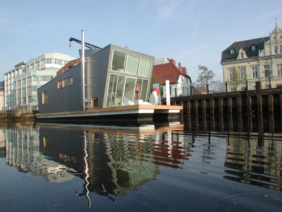 The Silberfisch, a modern floating home with 431 sq ft on the main deck plus a sleeping loft. | www.facebook.com/SmallHouseBliss