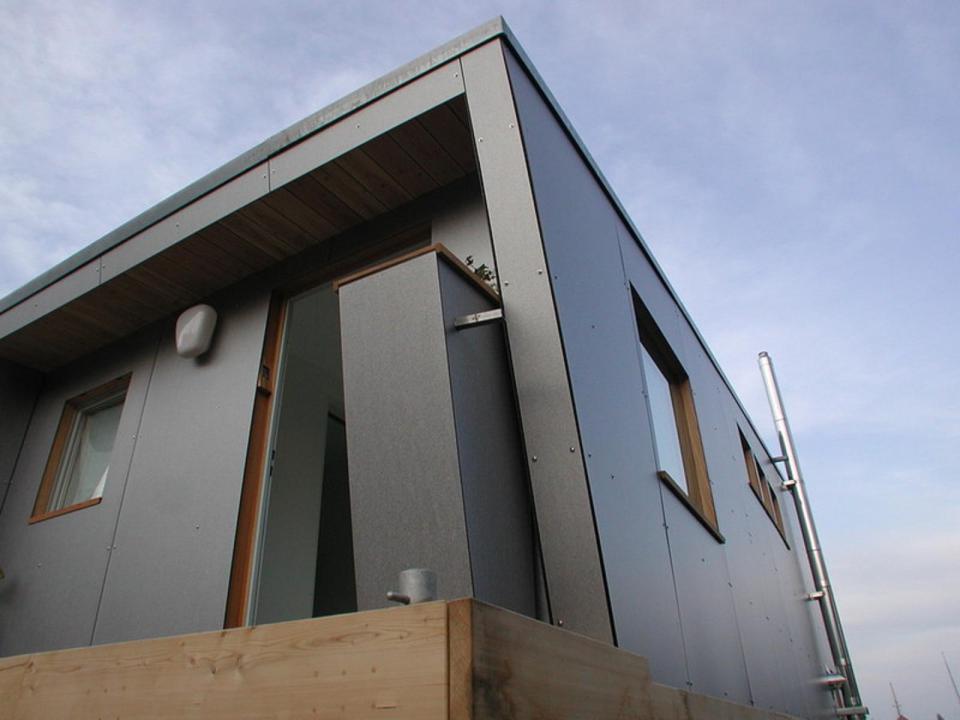 The Silberfisch, a modern floating home with 431 sq ft on the main deck plus a sleeping loft. | www.facebook.com/SmallHouseBliss