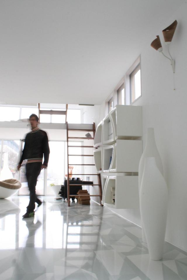 The Silberfisch, a modern floating home with 431 sq ft on the main deck plus a sleeping loft. | www.facebook.com/SmallHouseBliss