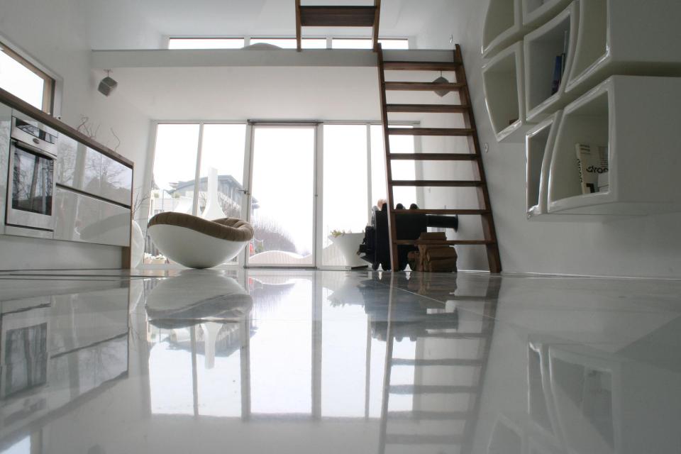 The Silberfisch, a modern floating home with 431 sq ft on the main deck plus a sleeping loft. | www.facebook.com/SmallHouseBliss