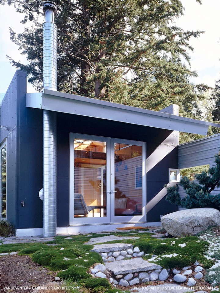 The C3 Cabin has nautical-inspired finishes and a compact 16' x 22' footprint with a lofted bedroom. | www.facebook.com/SmallHouseBliss