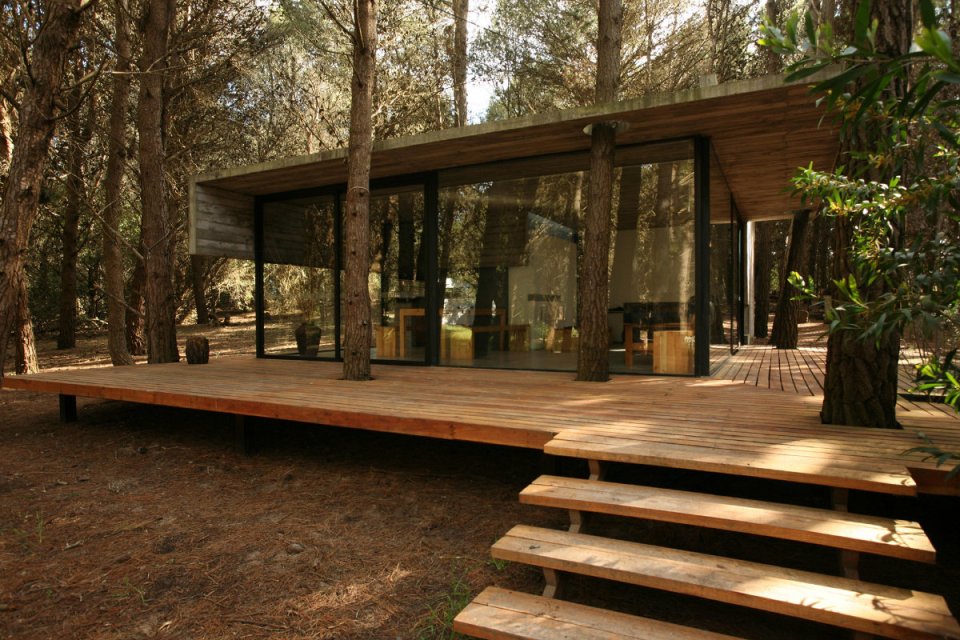 A low-maintenance concrete and glass house in Argentina with 2 bedrooms in 721 sq ft. | www.facebook.com/SmallHouseBliss