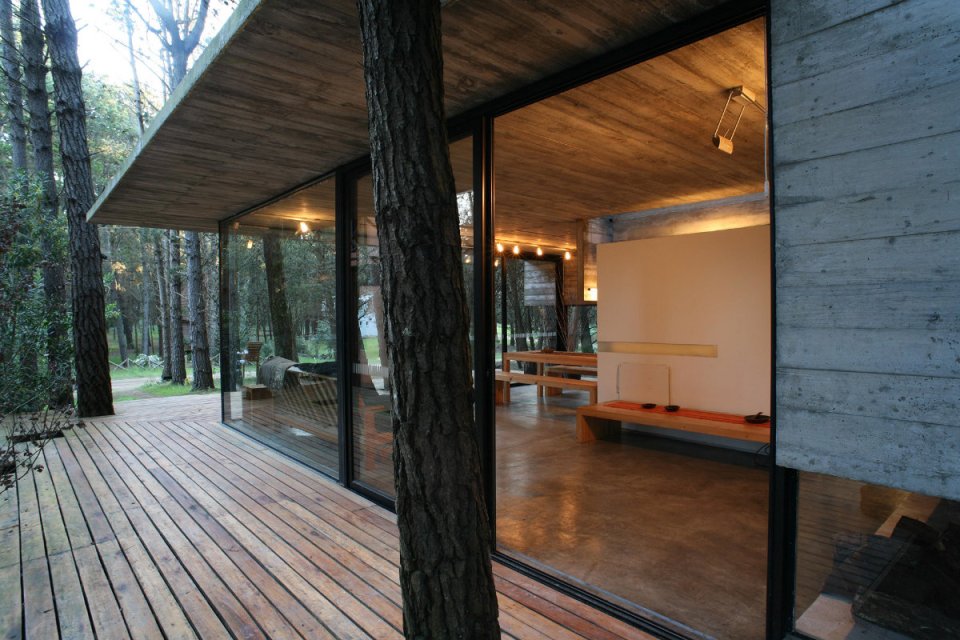 A low-maintenance concrete and glass house in Argentina with 2 bedrooms in 721 sq ft. | www.facebook.com/SmallHouseBliss