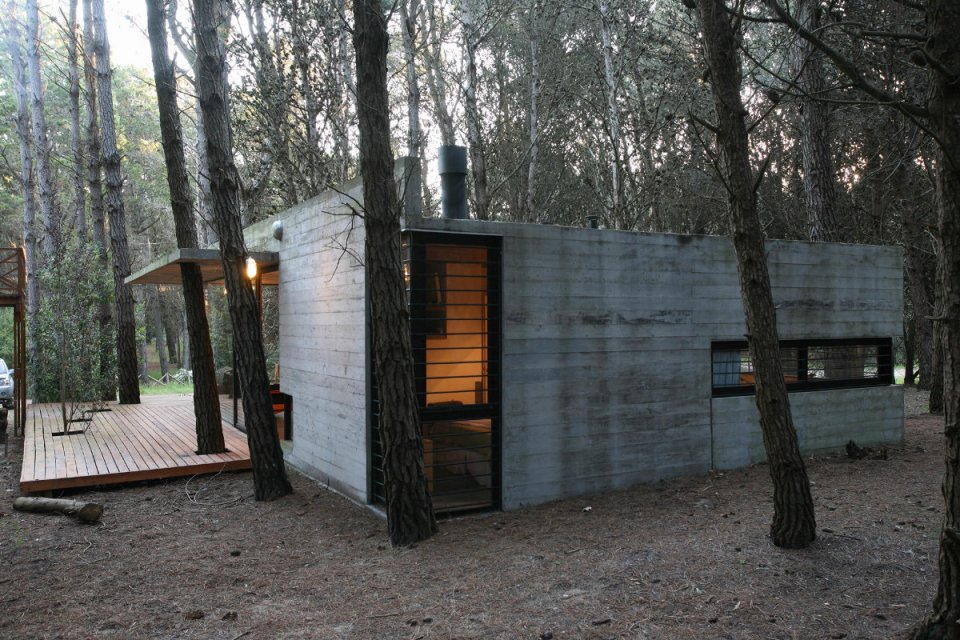 A low-maintenance concrete and glass house in Argentina with 2 bedrooms in 721 sq ft. | www.facebook.com/SmallHouseBliss