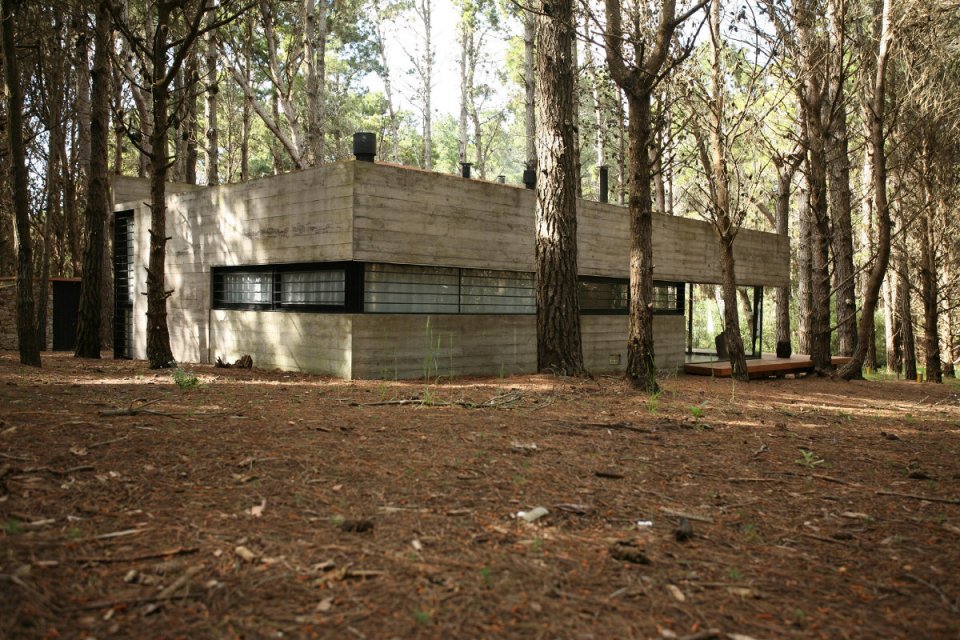 A low-maintenance concrete and glass house in Argentina with 2 bedrooms in 721 sq ft. | www.facebook.com/SmallHouseBliss