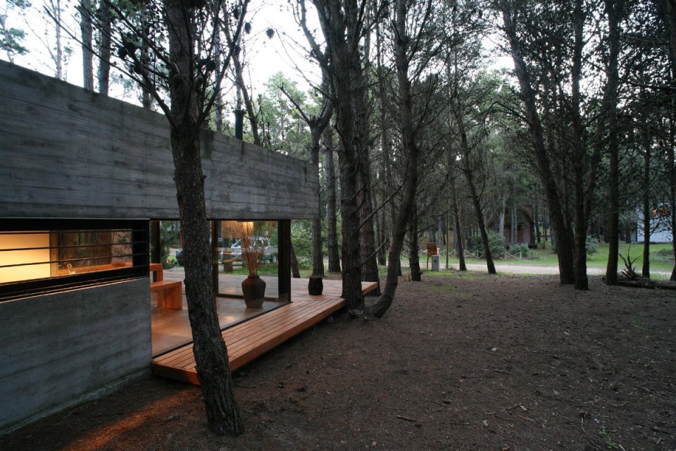 A low-maintenance concrete and glass house in Argentina with 2 bedrooms in 721 sq ft. | www.facebook.com/SmallHouseBliss