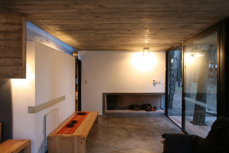 A low-maintenance concrete and glass house in Argentina with 2 bedrooms in 721 sq ft. | www.facebook.com/SmallHouseBliss