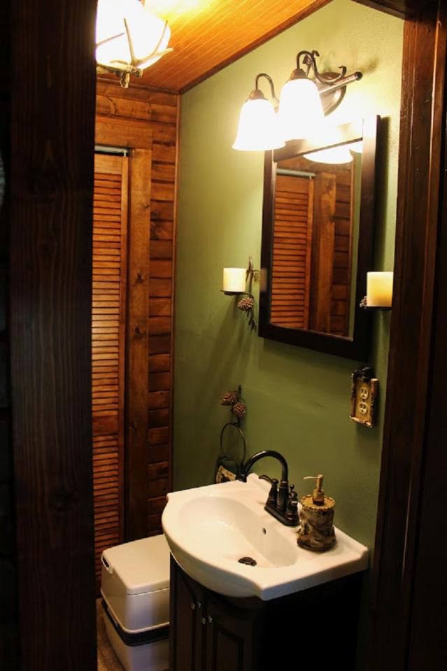 Dave Fosson's "ManCamp" cabin in the woods is 16' by 24' and has a sleeping loft. | www.facebook.com/SmallHouseBliss