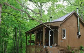 Dave Fosson's "ManCamp" cabin in the woods is 16' by 24' and has a sleeping loft. | www.facebook.com/SmallHouseBliss