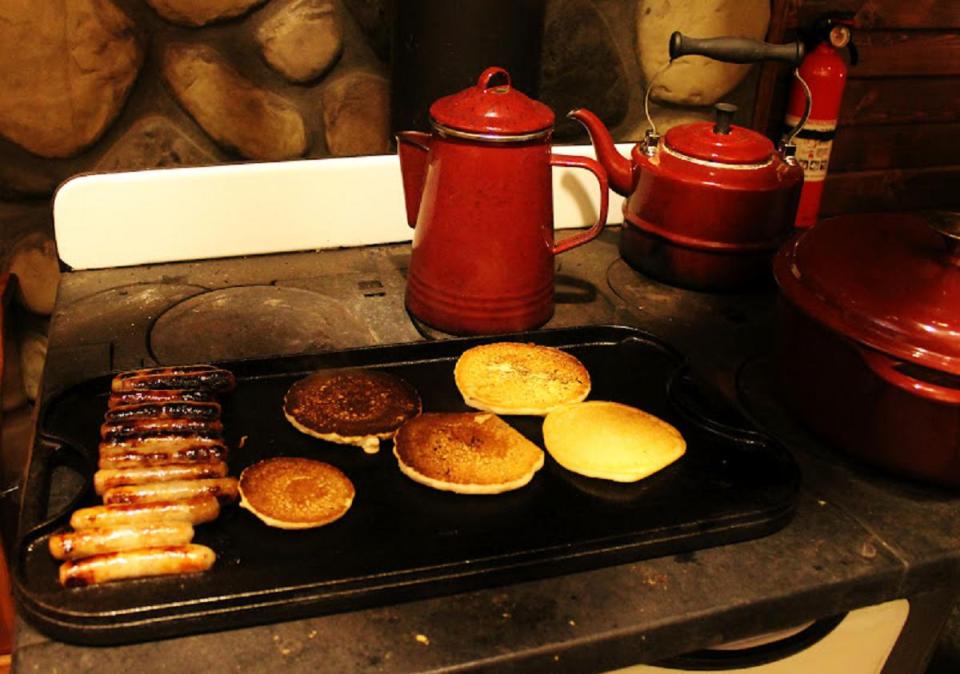 Dave Fosson's "ManCamp" cabin in the woods is 16' by 24' and has a sleeping loft. | www.facebook.com/SmallHouseBliss