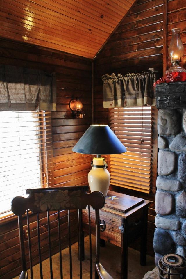 Dave Fosson's "ManCamp" cabin in the woods is 16' by 24' and has a sleeping loft. | www.facebook.com/SmallHouseBliss