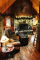 Dave Fosson's "ManCamp" cabin in the woods is 16' by 24' and has a sleeping loft. | www.facebook.com/SmallHouseBliss