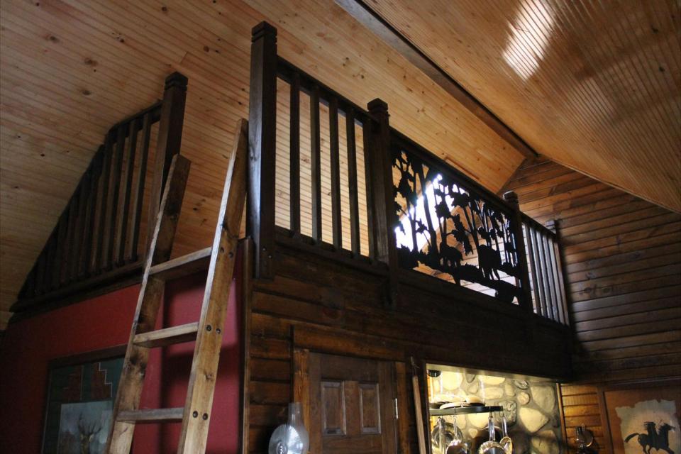 Dave Fosson's "ManCamp" cabin in the woods is 16' by 24' and has a sleeping loft. | www.facebook.com/SmallHouseBliss