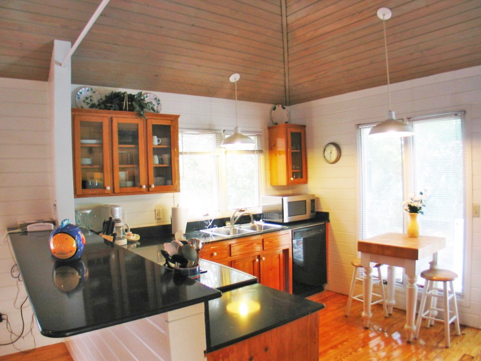 Dream Catcher Cottage in Seaside, Florida has 2 bedrooms and a large loft in 1,035 sq ft. | www.facebook.com/SmallHouseBliss