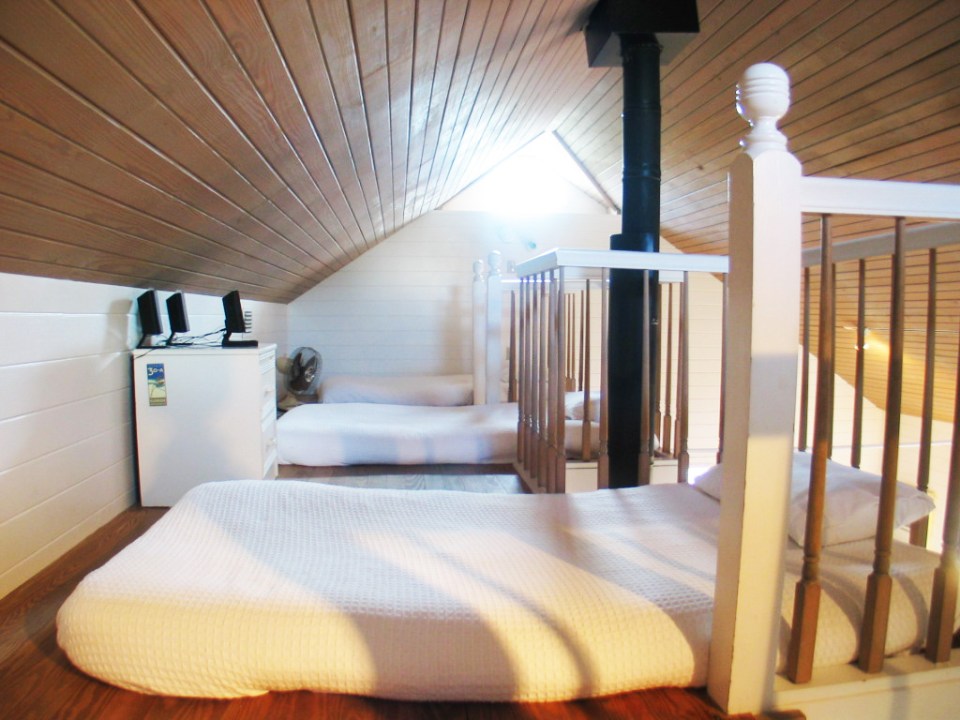 Dream Catcher Cottage in Seaside, Florida has 2 bedrooms and a large loft in 1,035 sq ft. | www.facebook.com/SmallHouseBliss