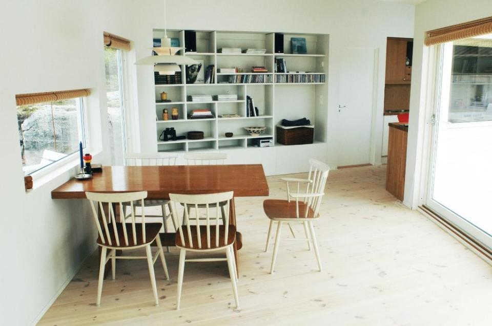 An irregular horseshoe-shaped floor plan provides shelter from the wind for this family cabin in Norway. It has 3 bedrooms in 829 sq ft. | www.facebook.com/SmallHouseBliss