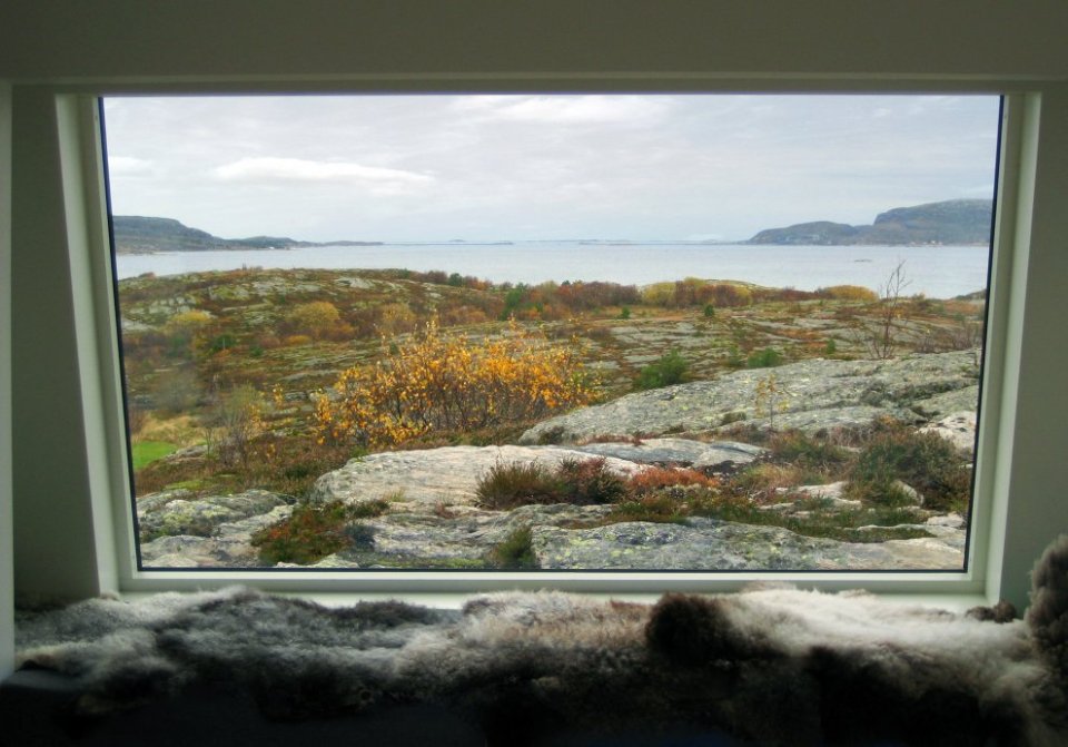 An irregular horseshoe-shaped floor plan provides shelter from the wind for this family cabin in Norway. It has 3 bedrooms in 829 sq ft. | www.facebook.com/SmallHouseBliss