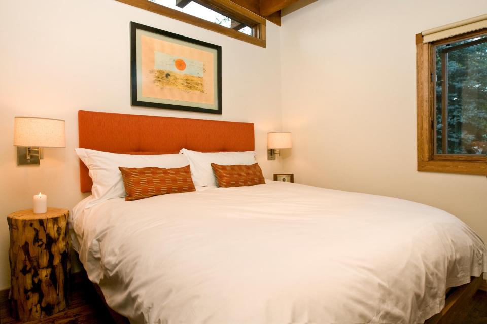 The WheelHaus Wedge, a small cabin on wheels. The "rustic modern" cabin has one bedroom in 400 sq ft. | www.facebook.com/SmallHouseBliss