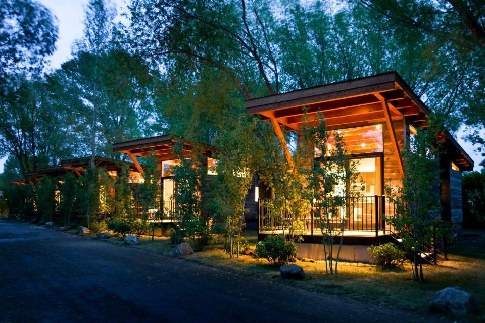 The WheelHaus Wedge, a small cabin on wheels. The "rustic modern" cabin has one bedroom in 400 sq ft. | www.facebook.com/SmallHouseBliss