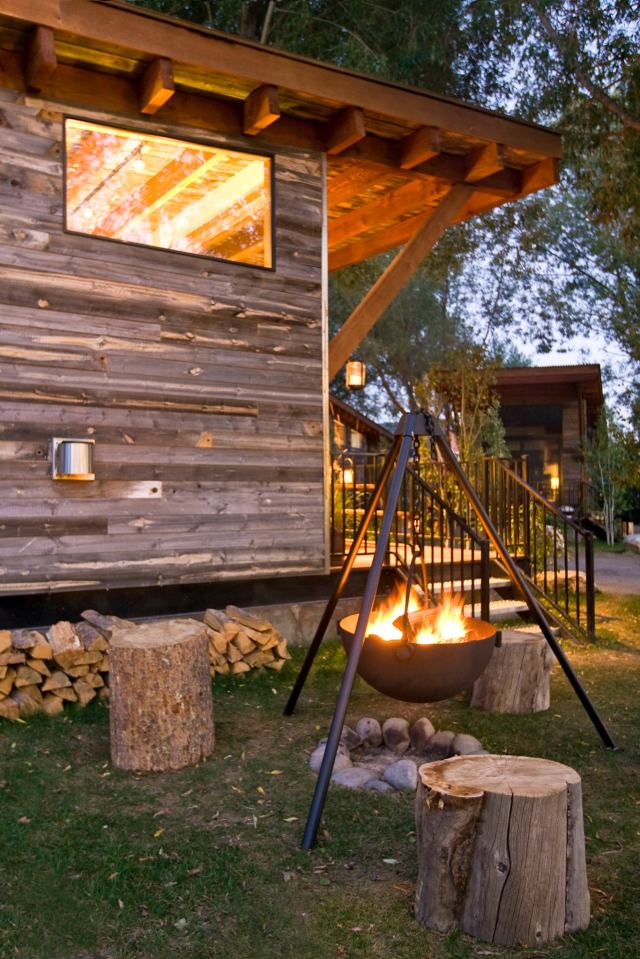 The WheelHaus Wedge, a small cabin on wheels. The "rustic modern" cabin has one bedroom in 400 sq ft. | www.facebook.com/SmallHouseBliss