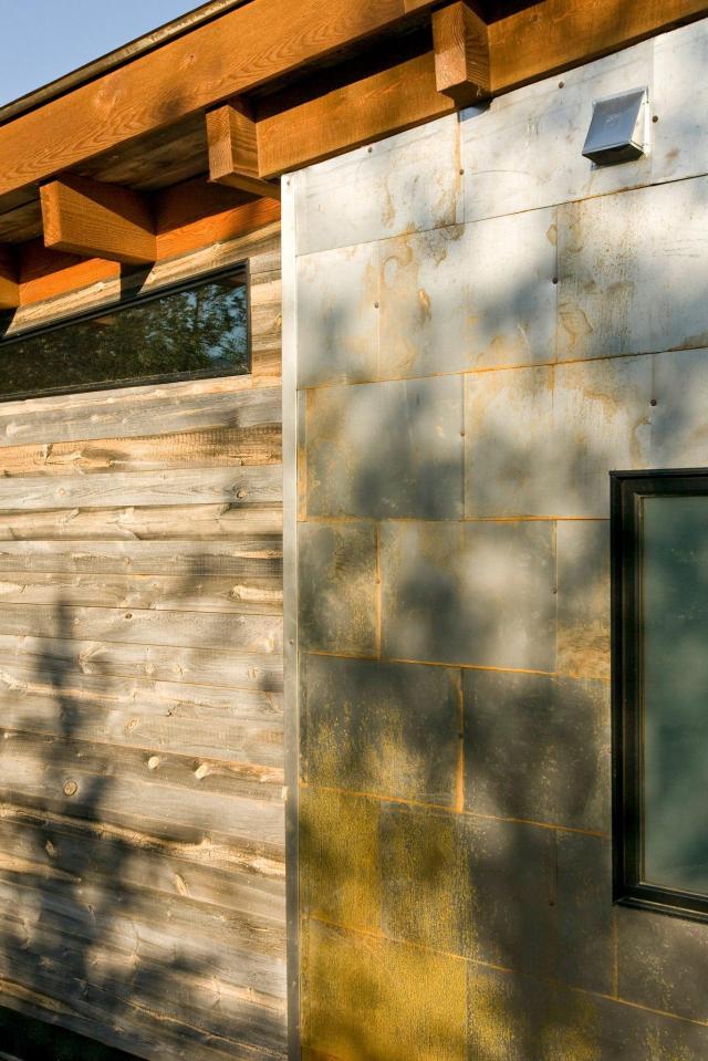 The WheelHaus Wedge, a small cabin on wheels. The "rustic modern" cabin has one bedroom in 400 sq ft. | www.facebook.com/SmallHouseBliss