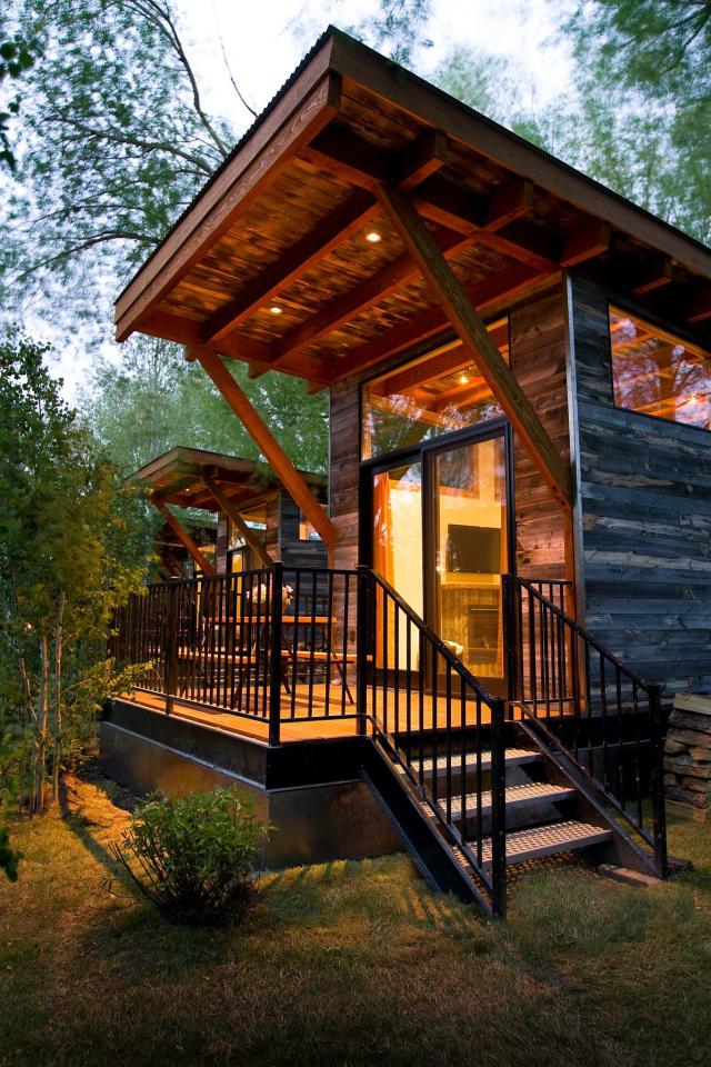 The WheelHaus Wedge, a small cabin on wheels. The "rustic modern" cabin has one bedroom in 400 sq ft. | www.facebook.com/SmallHouseBliss