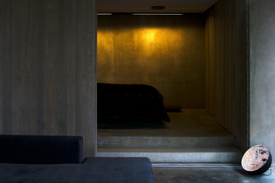 Mountain Retreat, an earth-sheltered modern cabin in New Zealand. It has a bedroom and a bunkroom in 1,076 sq ft. | www.facebook.com/SmallHouseBliss