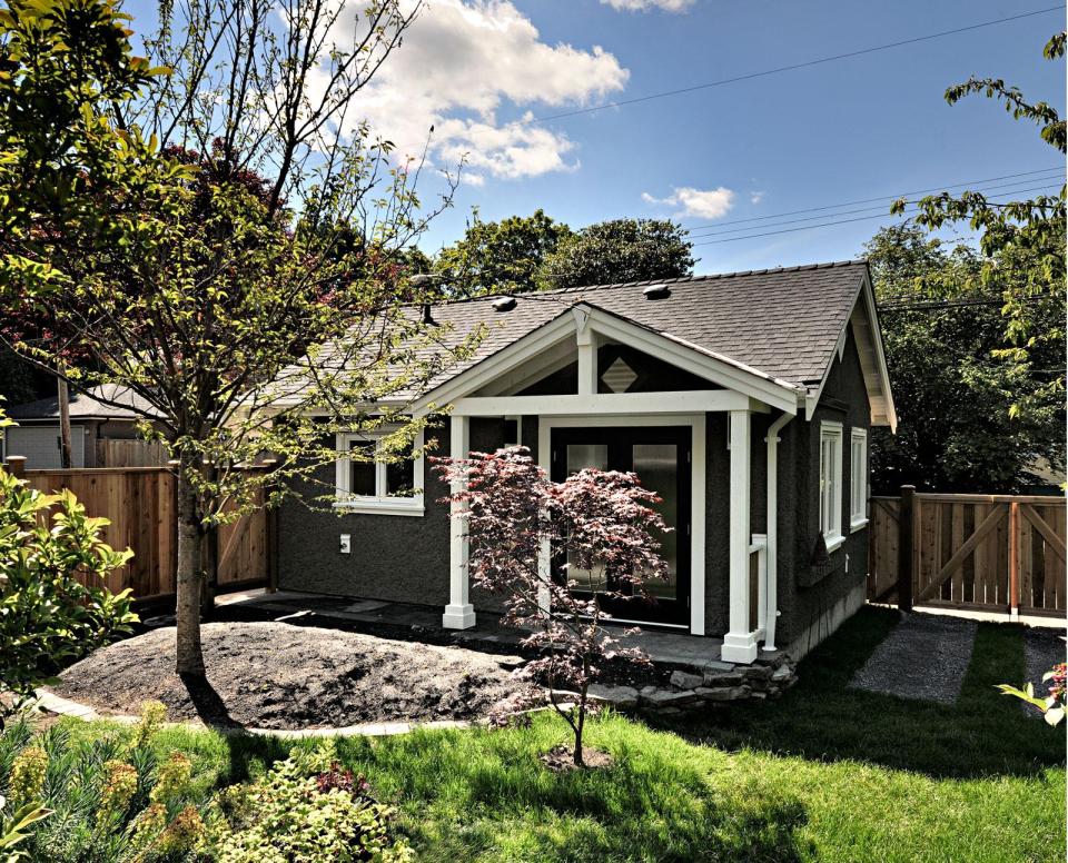 A small laneway house designed to blend with its traditional neighbors. The 400 sq ft cottage is a studio design with a sleeping loft. | www.facebook.com/SmallHouseBliss