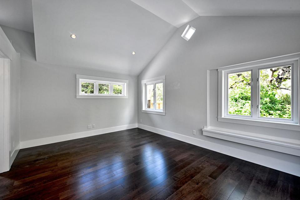 A small laneway house designed to blend with its traditional neighbors. The 400 sq ft cottage is a studio design with a sleeping loft. | www.facebook.com/SmallHouseBliss