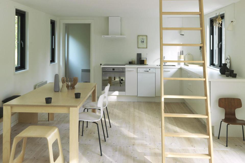 A modular vacation cottage in Denmark with two bedrooms and a sleeping loft in 797 sq ft. | www.facebook.com/SmallHouseBliss