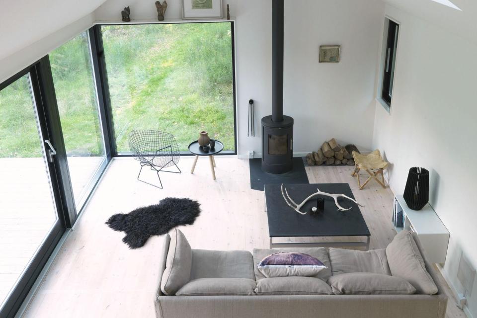 A modular vacation cottage in Denmark with two bedrooms and a sleeping loft in 797 sq ft. | www.facebook.com/SmallHouseBliss
