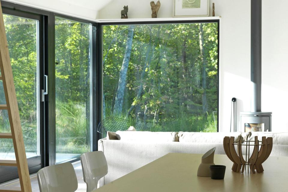 A modular vacation cottage in Denmark with two bedrooms and a sleeping loft in 797 sq ft. | www.facebook.com/SmallHouseBliss